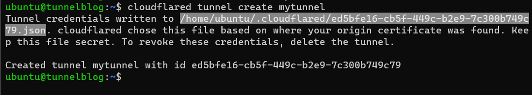 The command "cloudflared tunnel create mytunnel" being ran. The output gives a unique tunnel ID and credentials file path, with a note to keep the file secret.